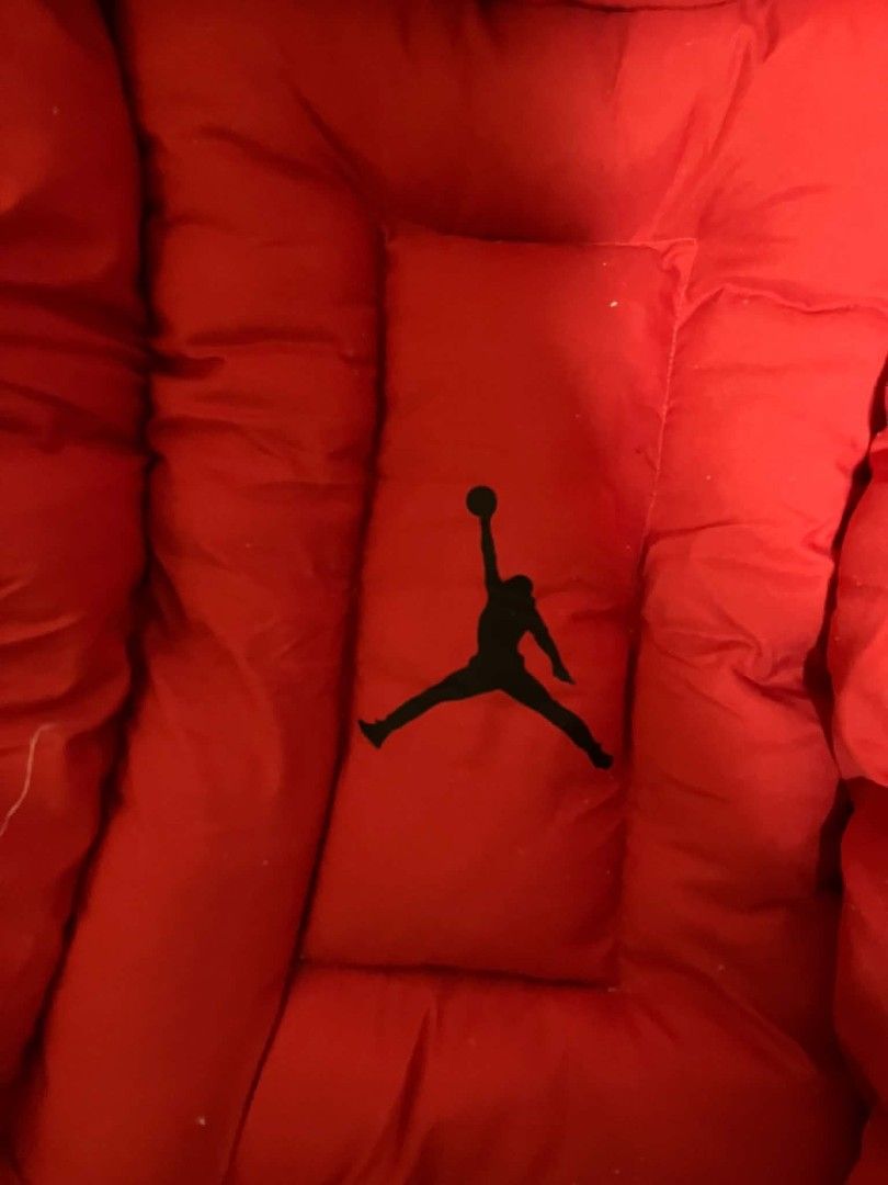 Jordan Jumpman Red and Grey Reversible Bed (Category: Bedding & Towels) located in Manila. Submitted by elvmoo (Listing ID 1465741416, Image 1). Description: could be a pet bed but i used this for my baby as newborn bed. used only for two months. reversible and washed, ready to use. 📍nangka, marikina.