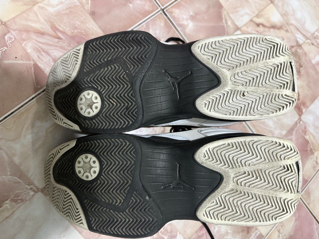 Jordan Max Aura 6 Flight (Category: Sneakers) located in Manila. Submitted by vinczentiments (Listing ID 1465751351, Image 1). Description: - Model: Jordan Flight sneakers - Colorway: Classic white and black with a gold Jumpman logo on the tongue - Materials: Durable mesh and leather panels with black laces and dark soles - Condition: Not wornout “walang pudpod” - Versatility: Perfect for basketball games or daily casual street outfits No Box.
