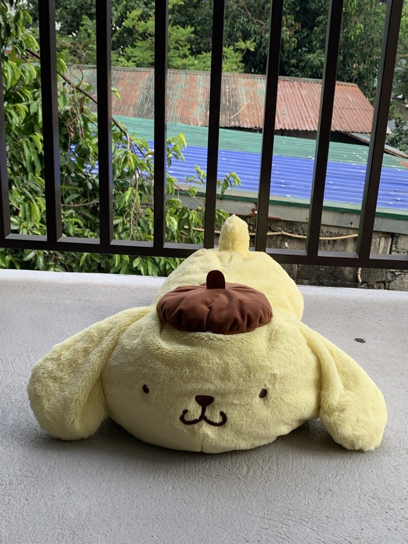 Jumbo Sanrio Pompompurin Lying Plush (Category: Plushies & Soft Toys) located in Angeles City. Submitted by pablokids (Listing ID 1465642055, Image 2). Description: - Authentic Pompompurin plushie in an adorable lying down pose - Super soft, squishy, and huggable material - Detailed with his iconic brown beret, brown paws, and tiny tail with an embroidered star - Perfect for cuddles or as a cute room decor piece -only issue is parang hindi na mas