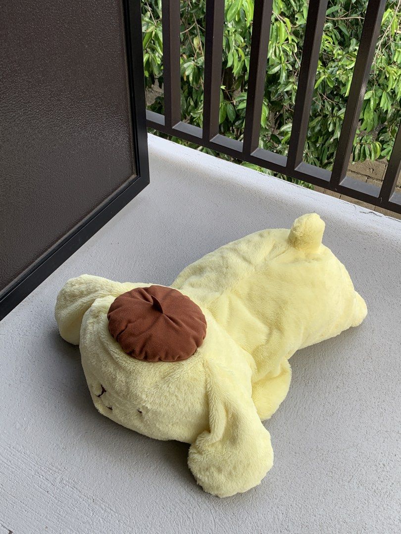 Jumbo Sanrio Pompompurin Lying Plush (Category: Plushies & Soft Toys) located in Angeles City. Submitted by pablokids (Listing ID 1465642055, Image 3). Description: - Authentic Pompompurin plushie in an adorable lying down pose - Super soft, squishy, and huggable material - Detailed with his iconic brown beret, brown paws, and tiny tail with an embroidered star - Perfect for cuddles or as a cute room decor piece -only issue is parang hindi na mas