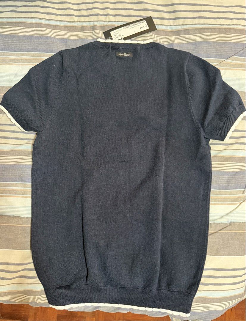 Kamiseta Knitted Navy Maylea Top Size M (Category: Sleeveless) located in Manila. Submitted by jay_bee888 (Listing ID 1465580533, Image 3). Description: BNWT Kamiseta Knitted Navy Blue - Size Medium - Knitted short sleeve top with contrasting white scalloped trim on neckline, cuffs, and hem - Knitted Stretchable fabric ( fit up to 38 bust max ) .