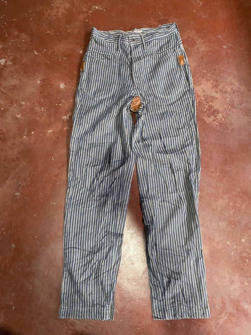 Kapital Hickory Stripe Work Pants (Category: Trousers) located in Laguindingan. Submitted by purto_nato42 (Listing ID 1465730096, Image 1). Description: - Brand: Kapital (Made in Japan) - Style: Hickory stripe work trousers with straight leg fit - Details: Blue and white striped heavy-duty fabric with unique brown leather reinforcement patches at pockets and crotch - Closure: Classic button fly - Size: Tagged Size 1 - Condition: Excellent, heavy-