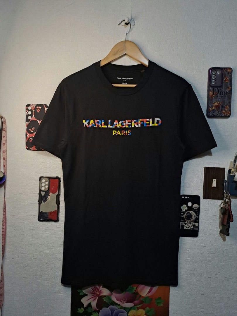 Karl Lagerfeld Paris Multicolored Rainbow Spellout (Category: Tshirts & Polo Shirts ) located in Quezon City. Submitted by yaseen73 (Listing ID 1465651650, Image 1). Description: Karl Lagerfeld Paris Multicolored Rainbow Logo Spellout Across the Chest Made in Peru - 3D Puff Print - Light Weight - Wearing Size : XS on Tag - Dimensions : Width 18 Length 29 - Color Rate : 9.9/10 - Issue : 2 Pinholes But Not Barely Visible (See Last Photo) - Conditio