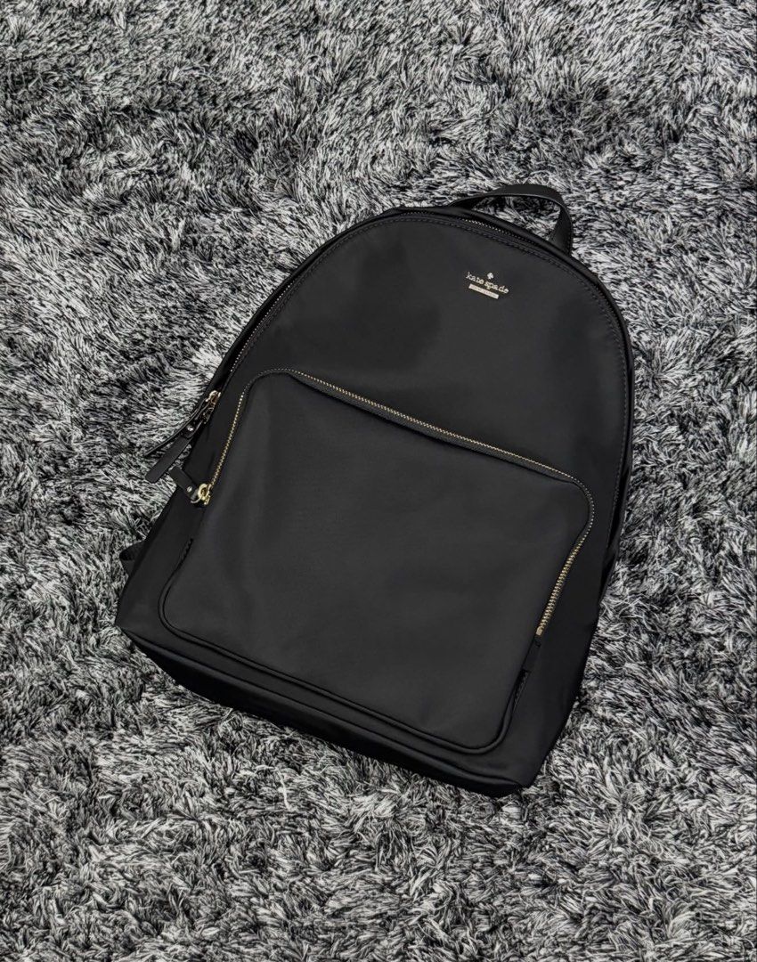 Kate Spade Back Pack (Category: Backpacks) located in Quezon City. Submitted by declutteringcloset18 (Listing ID 1465581246, Image 1). Description: Barely used! Retails ~ 20k+++ Note minor stains on interior zipper lining No tears/rips See photos for details .