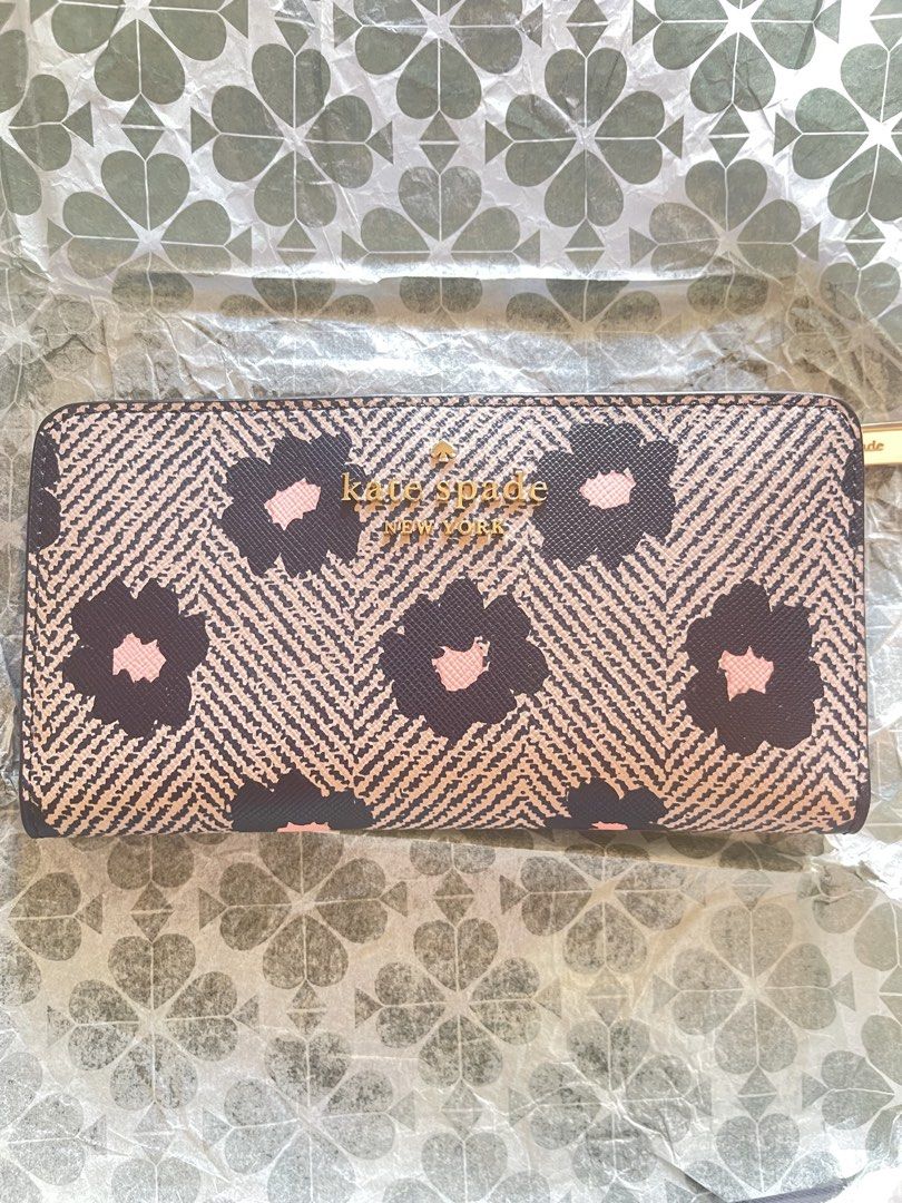 Kate Spade Staci Floral Herringbone Continental Wallet (Category: Wallets & Card holders) located in Manila. Submitted by schylerlucas (Listing ID 1465593199, Image 2). Description: Available on hand, ready to ship Brand new - Authentic Kate Spade Staci Wallet - Black multi floral print on herringbone background - Secure zip-around closure with gold-tone hardware - Exterior back zip pocket for coins or receipts - Interior lined with black leather