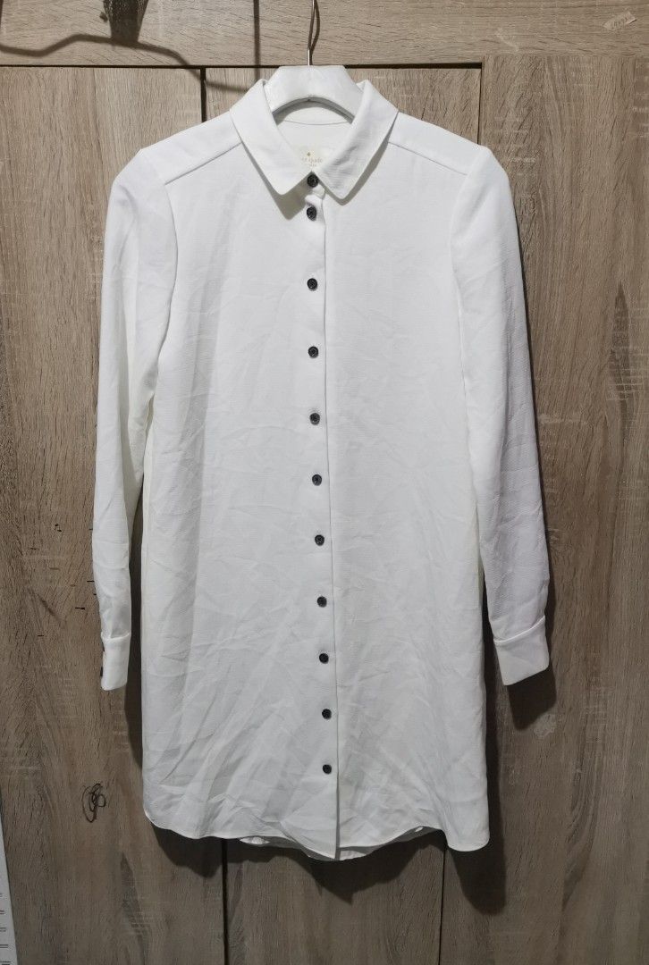 Kate Spade white button down (Category: Longsleeves) located in San Pedro. Submitted by thriftersthrift (Listing ID 1465583016, Image 1). Description: Width(inches) :18 Length(inches) :34 Good condition Already wash Color rate : 10 /10 🌵ALL ITEMS ARE FROM UKAY BALE SO MANAGE YOUR EXPECTATION 🌵 ASK SELLER FOR MORE INFORMATION COLOR MAY CHANGE TRU LIGHTING.