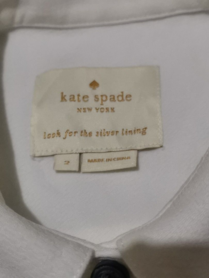 Kate Spade white button down (Category: Longsleeves) located in San Pedro. Submitted by thriftersthrift (Listing ID 1465583016, Image 3). Description: Width(inches) :18 Length(inches) :34 Good condition Already wash Color rate : 10 /10 🌵ALL ITEMS ARE FROM UKAY BALE SO MANAGE YOUR EXPECTATION 🌵 ASK SELLER FOR MORE INFORMATION COLOR MAY CHANGE TRU LIGHTING.