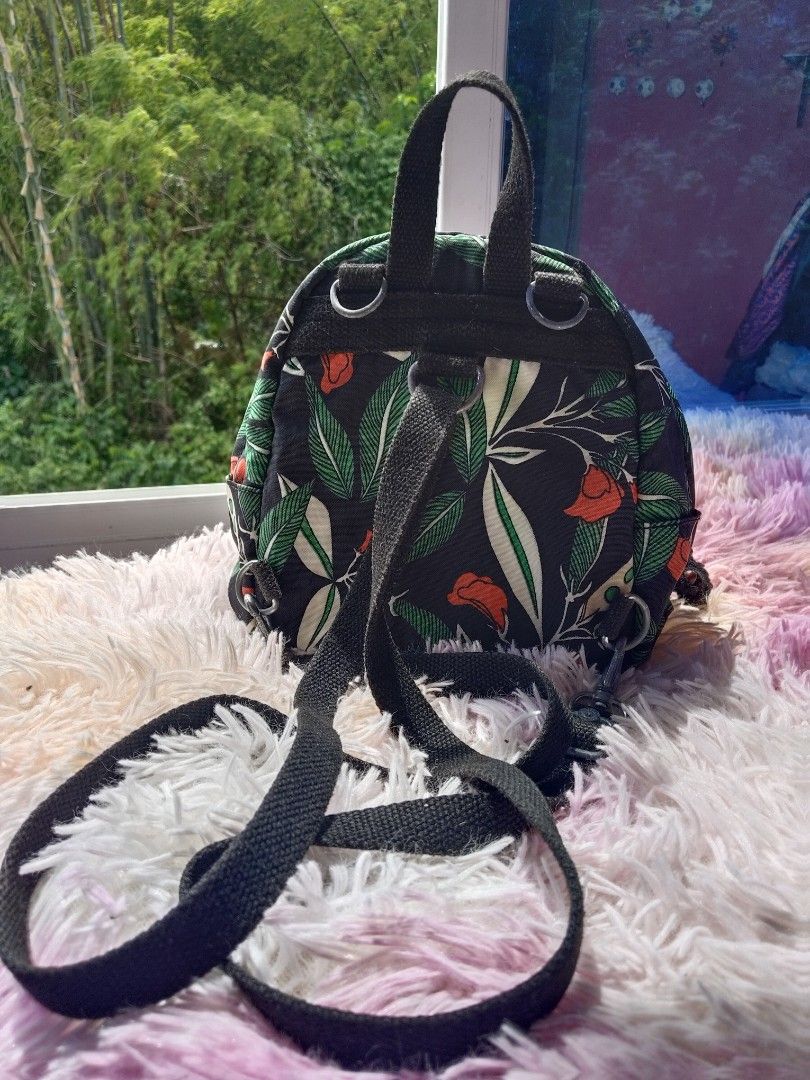 Kipling Convertible Mini Backpack (Tropical Floral) (Category: Backpacks) located in Siquijor. Submitted by thesummit26 (Listing ID 1465726089, Image 2). Description: The hardwares show normal signs of use but are not tarnished at all—they are still clean and fully functional as seen in the photos. Converts easily from a backpack to a crossbody bag via removable straps. Hig.