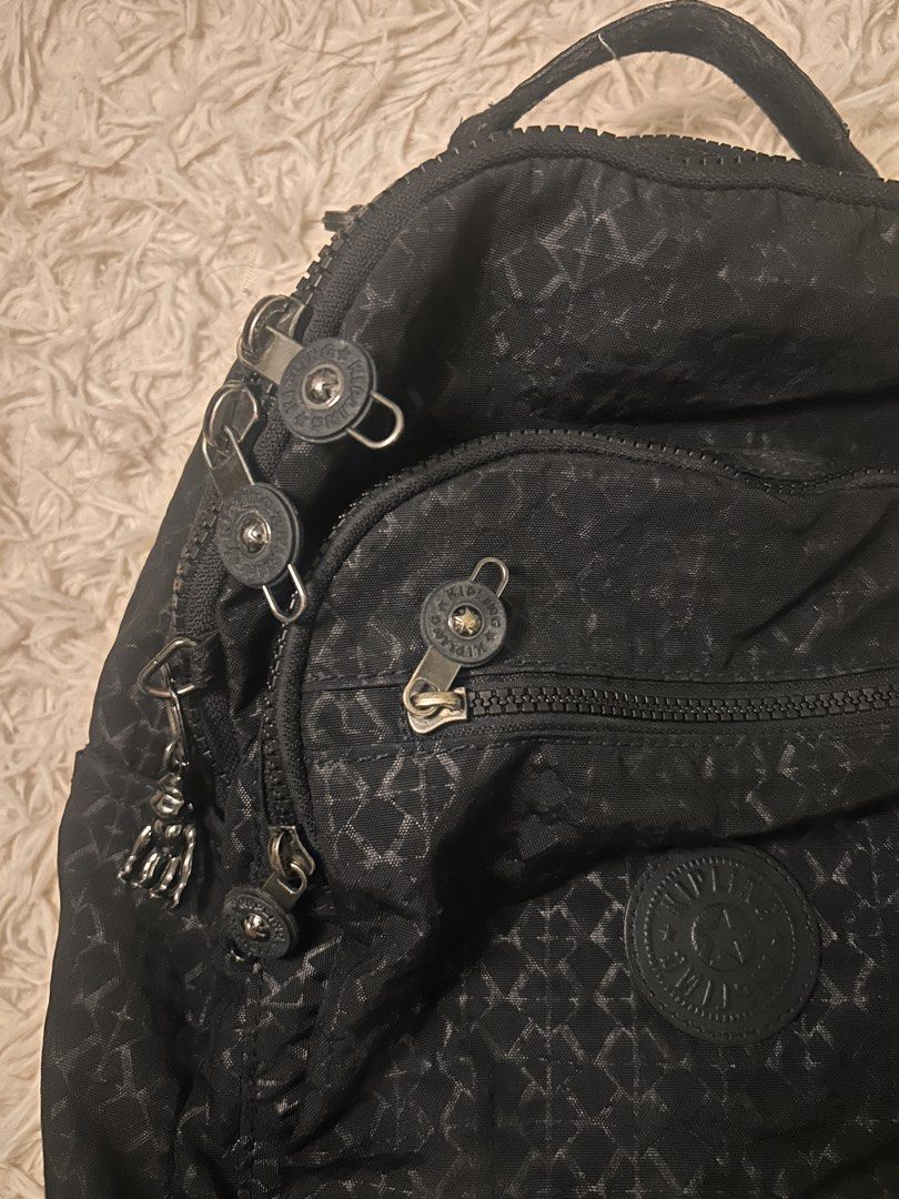 Kipling Delia Mini — Black / Noir Sign Jacquard Backpack | Authentic (Category: Backpacks) located in Manila. Submitted by kashrain (Listing ID 1465603967, Image 3). Description: Kipling Delia Mini — Black / Noir Sign Jacquard Backpack | Authentic -Authentic Issue: Inside pocket stain Loc: Cavite/Metro Manila | Lalamove / J&T / LBC / Meet-up dm for more deets/info! IG: @kash.rain curated by: @endonilarain.