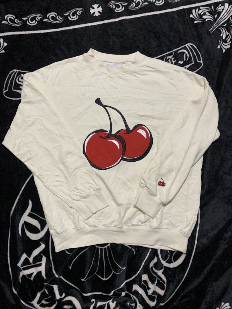 Kirsh Cherry Sweatshirt Off-White Size 1 (Category: Longsleeves) located in Iloilo. Submitted by johnpullan30303 (Listing ID 1465710134, Image 1). Description: - Brand: Kirsh - Color: Off-white - Size: 1 - Design: Large embroidered cherry on chest, small cherry logo on left sleeve cuff - Material: Thick cotton fleece, warm and comfortable - Details: Ribbed collar, cuffs, and hem - Condition: Great everyday streetwear piece.