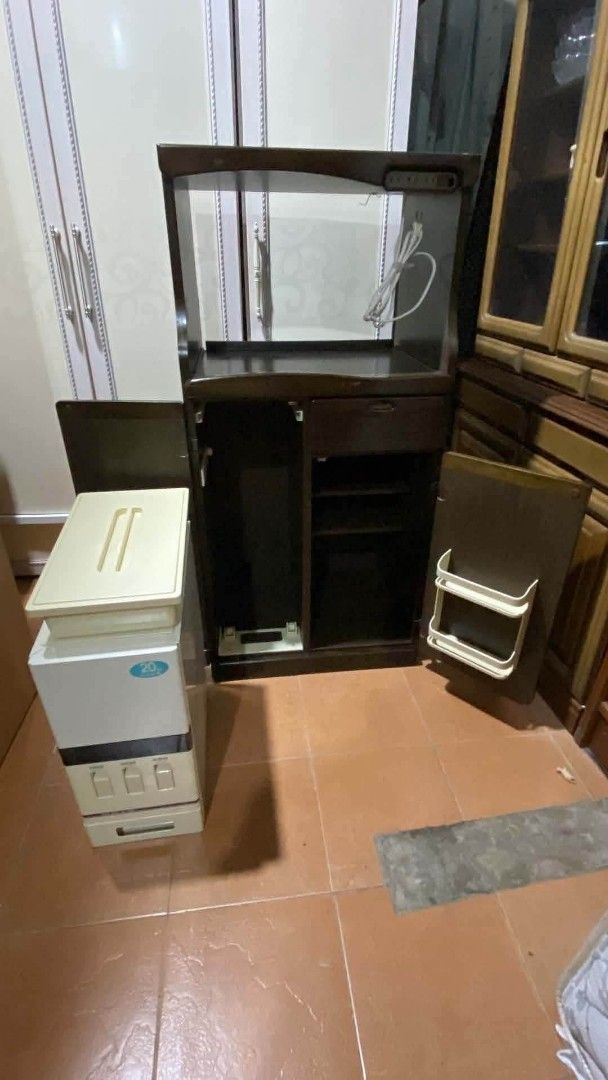 Kitchen Side Cabinet Oven Rack Coffee Nook (Category: Shelves, Cabinets & Racks) located in Quezon City. Submitted by dannikkishoppe2 (Listing ID 1465686415, Image 3). Description: Kitchen Side Cabinet Oven Rack Coffee Nook ‼️₱6000‼️ L23.5 W18 H48 inches Pullout tray: L20.5 W15.5 H13.5 inches *with 20kg rice dispenser *with small pantry and pullout tray *removable shelves *with built-in outlet for microwave, rice cooker, or other appliances Pleas