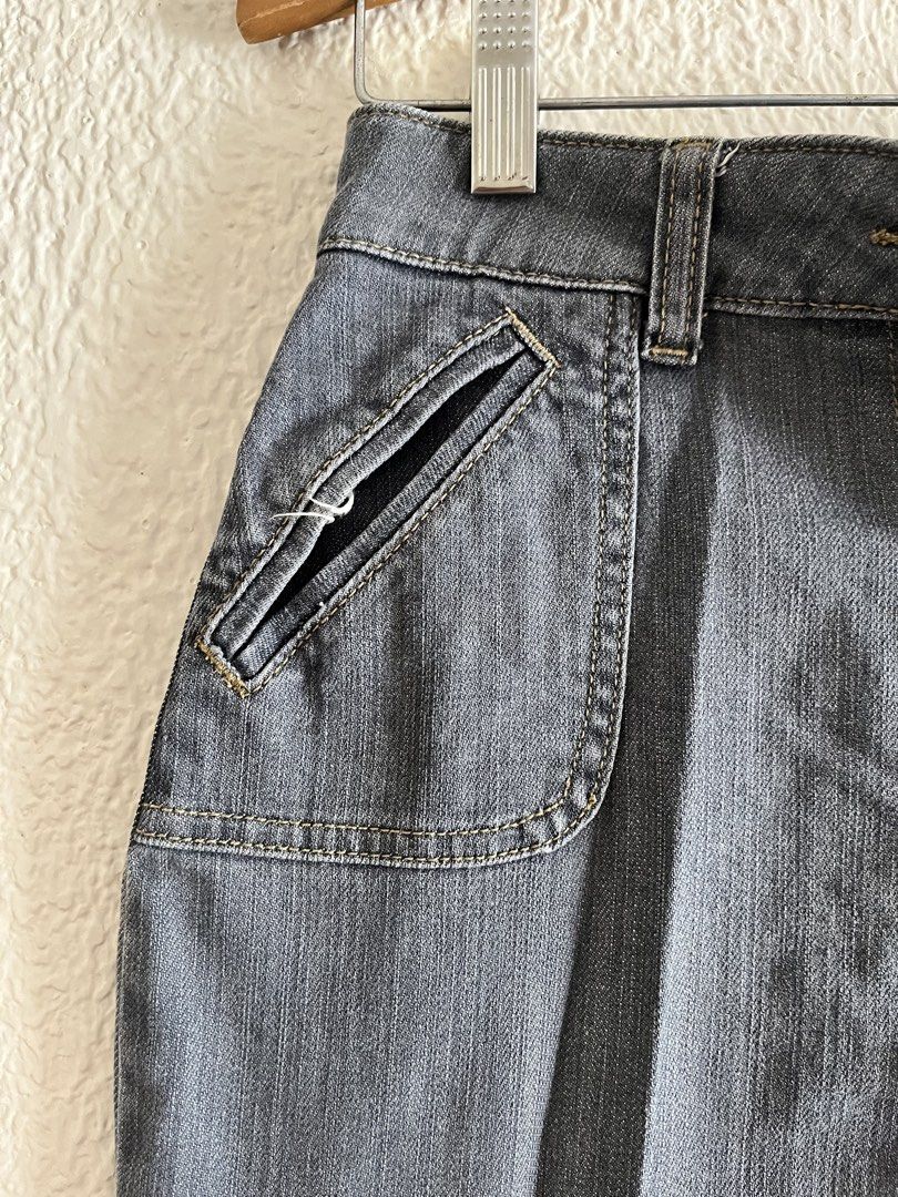 Kookaï Grey Denim Button-Front Mini Skirt Size 36 (Category: Skirts) located in Cebu City. Submitted by danabelleza (Listing ID 1465630383, Image 2). Description: - Brand: Kookaï - Size: 36 (Fits Small) - Color: Grey - Material: Denim - Features: Front button-down closure with silver hardware, two front patch pockets with angled zippers, and belt loops - Condition: Excellent, versatile piece for casual everyday wear.