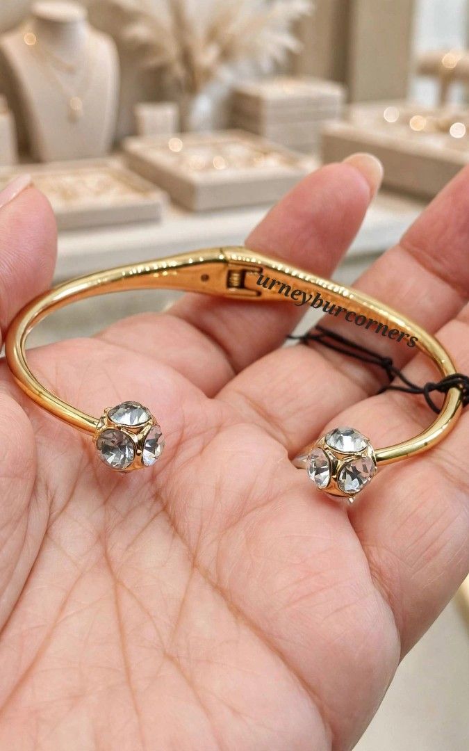 KS NY LADY MARMALADE BANGLE (Category: Bracelets) located in Imus. Submitted by urneyburcorners (Listing ID 1465582891, Image 2). Description: A golden hinged bangle with clear glittering deco ball crystal cluster stone. Gold tone open cuff bangle bracelet, clear crystal stone, 2 1/4 diameter. non turnish 100% original.