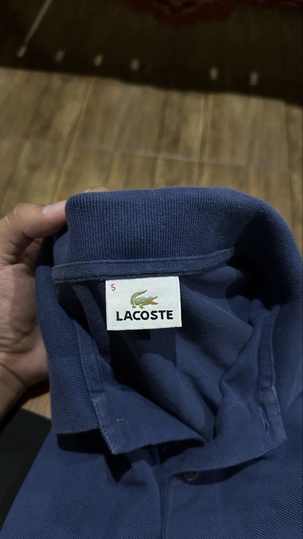 LACOSTE BLUE POLO SHIRT (Category: Tshirts & Polo Shirts ) located in Manila. Submitted by urban.vintage (Listing ID 1465735064, Image 2). Description: ISSUE: NONE (NEED WASH) MOP :GCASH (NO COD) SHIP VIA: LALAMOVE & J&T LOCATION: PASIG CITY LENGTH: 28 WIDTH :23.