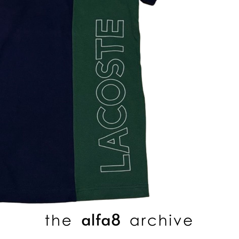 [S] LACOSTE | Authentic Colorblock Regular Fit Polo Shirt Navy Blue Red Green (Category: Tshirts & Polo Shirts ) located in Imus. Submitted by thealfa8archive (Listing ID 1465743997, Image 3). Description: - Brand: Lacoste - Style: Colorblock polo shirt (Navy Blue, Red, Green) with bold vertical LACOSTE lettering - Size: FR 3 / US Small (Regular Fit) - Details: Short sleeves, 3-button placket, contrast yellow inner collar lining, classic embroide