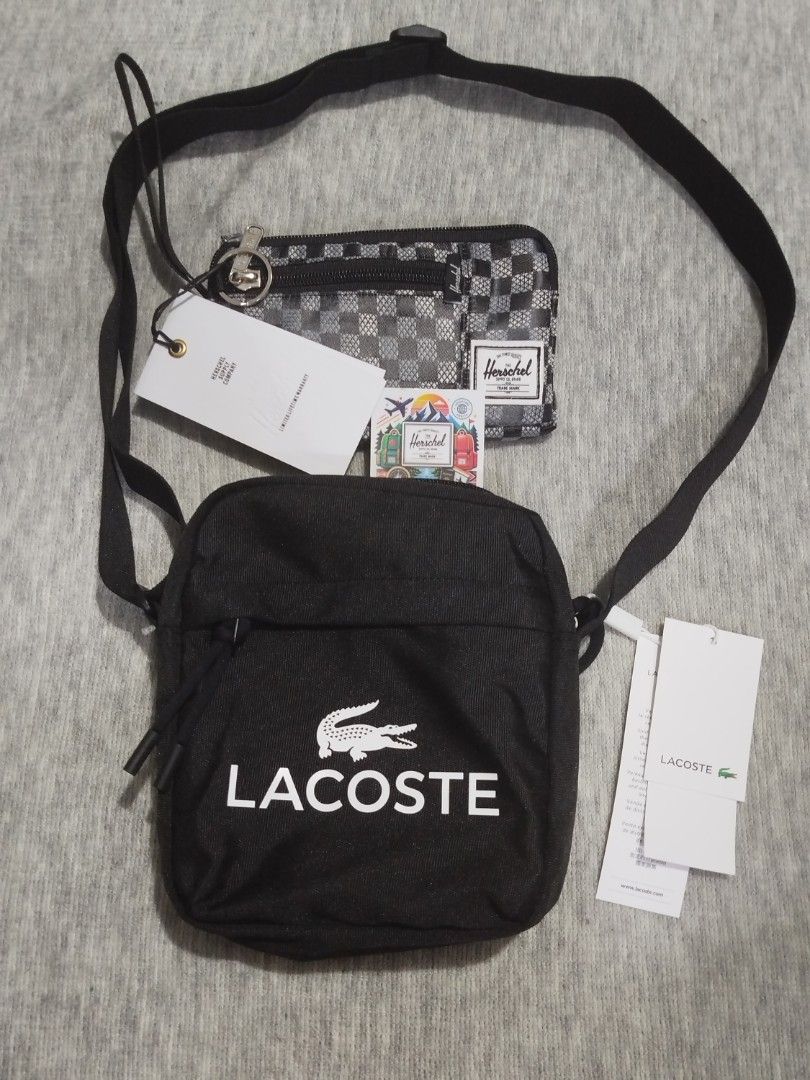 Lacoste Crossbody Bag and Herschel Pouch Bundle (Category: Cross-body Bags) located in Quezon City. Submitted by thirdeedimesiv (Listing ID 1465694969, Image 1). Description: - Brand: Lacoste & Herschel - Condition: Brand new with original tags, sealed in clear plastic - Lacoste Crossbody Bag: Sleek black design with a prominent white front logo and an adjustable black strap - Herschel Pouch: Stylish black-and-white checkered pattern, secure zipp