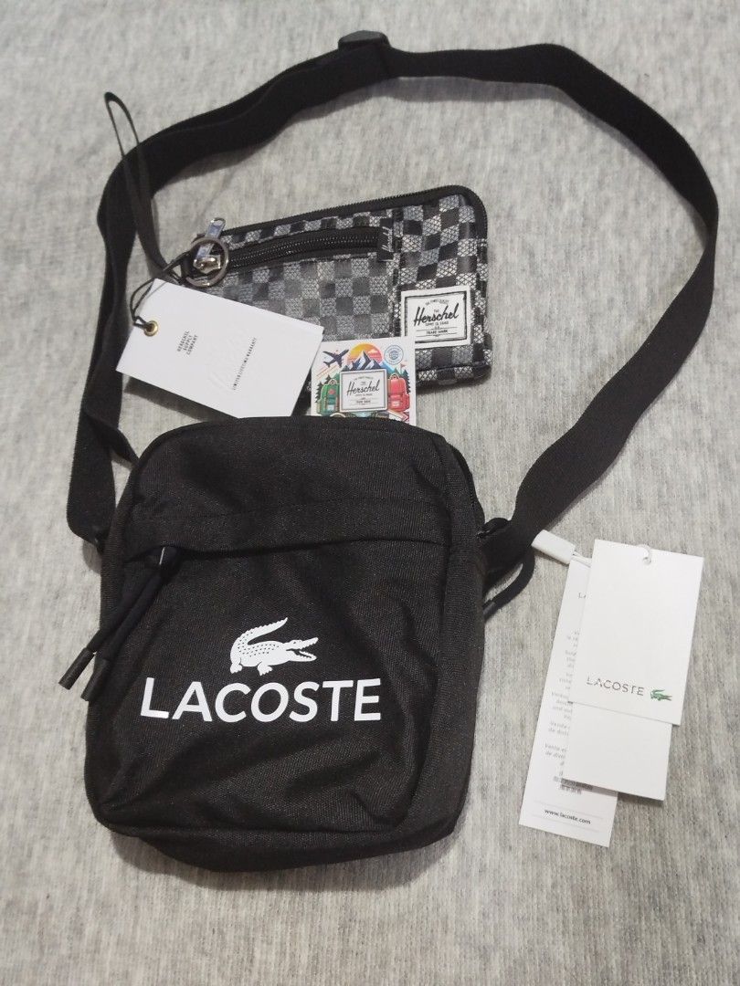 Lacoste Crossbody Bag and Herschel Pouch Bundle (Category: Cross-body Bags) located in Quezon City. Submitted by thirdeedimesiv (Listing ID 1465694969, Image 3). Description: - Brand: Lacoste & Herschel - Condition: Brand new with original tags, sealed in clear plastic - Lacoste Crossbody Bag: Sleek black design with a prominent white front logo and an adjustable black strap - Herschel Pouch: Stylish black-and-white checkered pattern, secure zipp