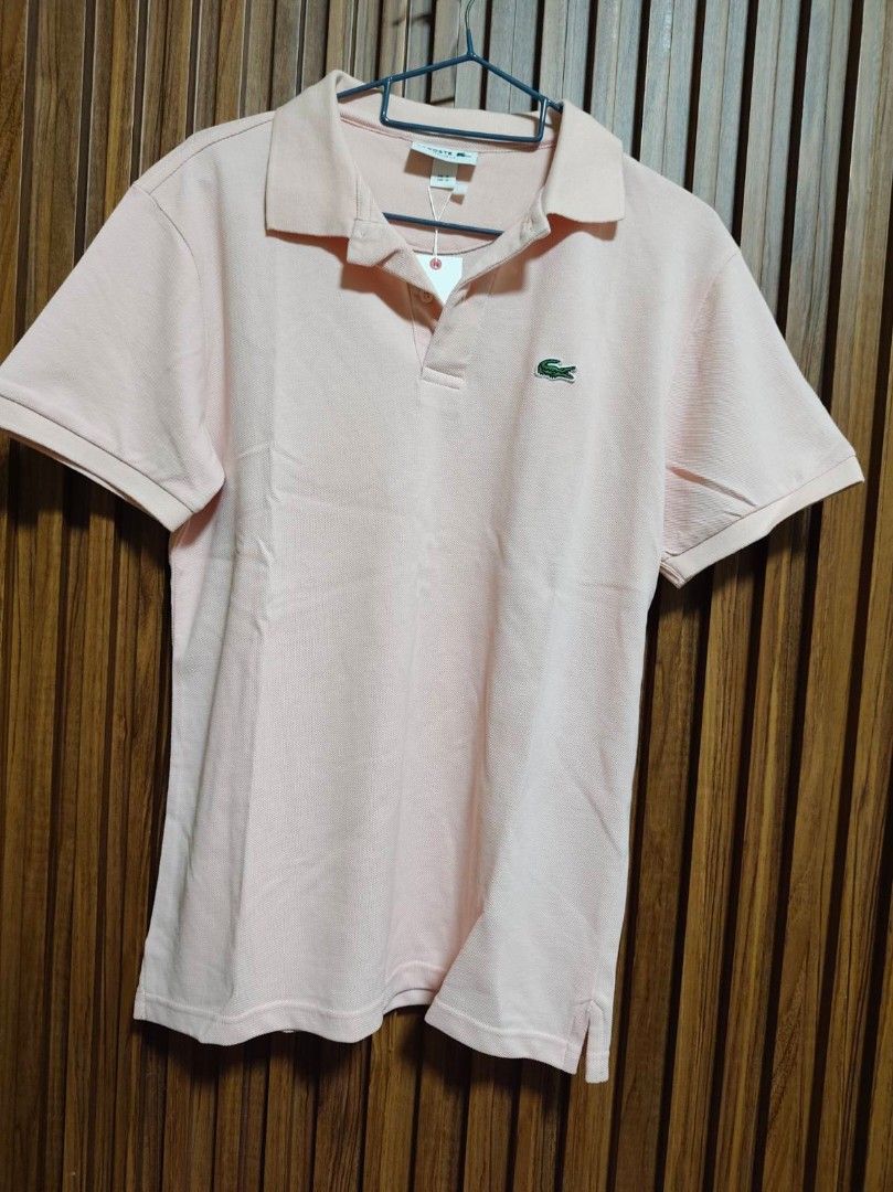 Lacoste Men's/ unisex regular fit( light pink) (Category: Tshirts & Polo Shirts ) located in Cavite. Submitted by oncetop_declutter (Listing ID 1465676282, Image 1). Description: brand new with hang tag regular fit unisex shipping fee c/o buyer.