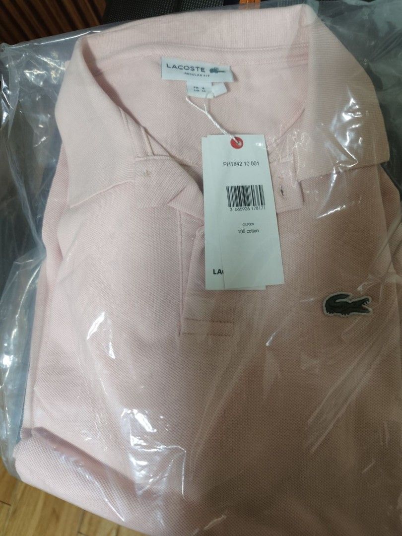 Lacoste Men's/ unisex regular fit( light pink) (Category: Tshirts & Polo Shirts ) located in Cavite. Submitted by oncetop_declutter (Listing ID 1465676282, Image 3). Description: brand new with hang tag regular fit unisex shipping fee c/o buyer.
