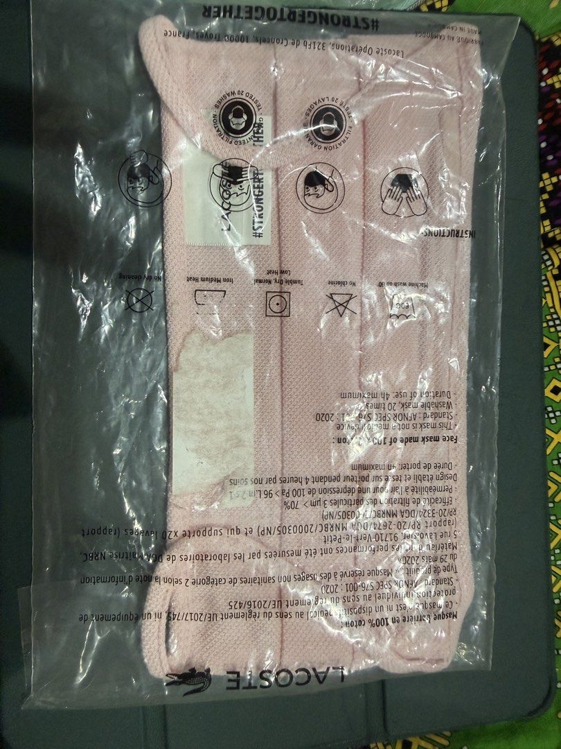Lacoste Pink Cotton Face Mask #STRONGETOGETHER (Category: Face Masks & Face Shields) located in Manila. Submitted by friskymall (Listing ID 1465706725, Image 2). Description: - Brand new and still sealed in original packaging - 100% breathable cotton for comfortable daily wear - AFNOR SPEC S76-001: 2020 certified for quality and safety - Reusable and washable up to 20 times - Features the classic embroidered Lacoste crocodile logo and #STRONGETOG