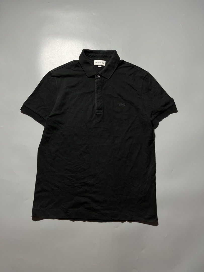 Lacoste Polo Shirt (Black) (Category: Tshirts & Polo Shirts ) located in Quezon City. Submitted by metro_junkie.ph (Listing ID 1465707411, Image 1). Description: Lacoste Polo Shirt (Black) Size 4/Medium on Tag (20 x 28) Can Pass as Excellent Condition Color Rate May Be 9.5/10 (Prestine) Authentic No any Flaw/Issue(s), Just Need Wash All Detail Posted 880 + SF (or offer).