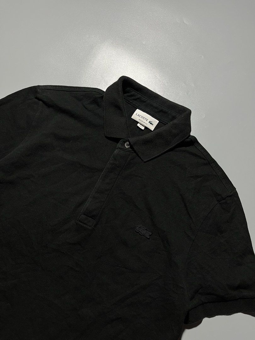 Lacoste Polo Shirt (Black) (Category: Tshirts & Polo Shirts ) located in Quezon City. Submitted by metro_junkie.ph (Listing ID 1465707411, Image 2). Description: Lacoste Polo Shirt (Black) Size 4/Medium on Tag (20 x 28) Can Pass as Excellent Condition Color Rate May Be 9.5/10 (Prestine) Authentic No any Flaw/Issue(s), Just Need Wash All Detail Posted 880 + SF (or offer).