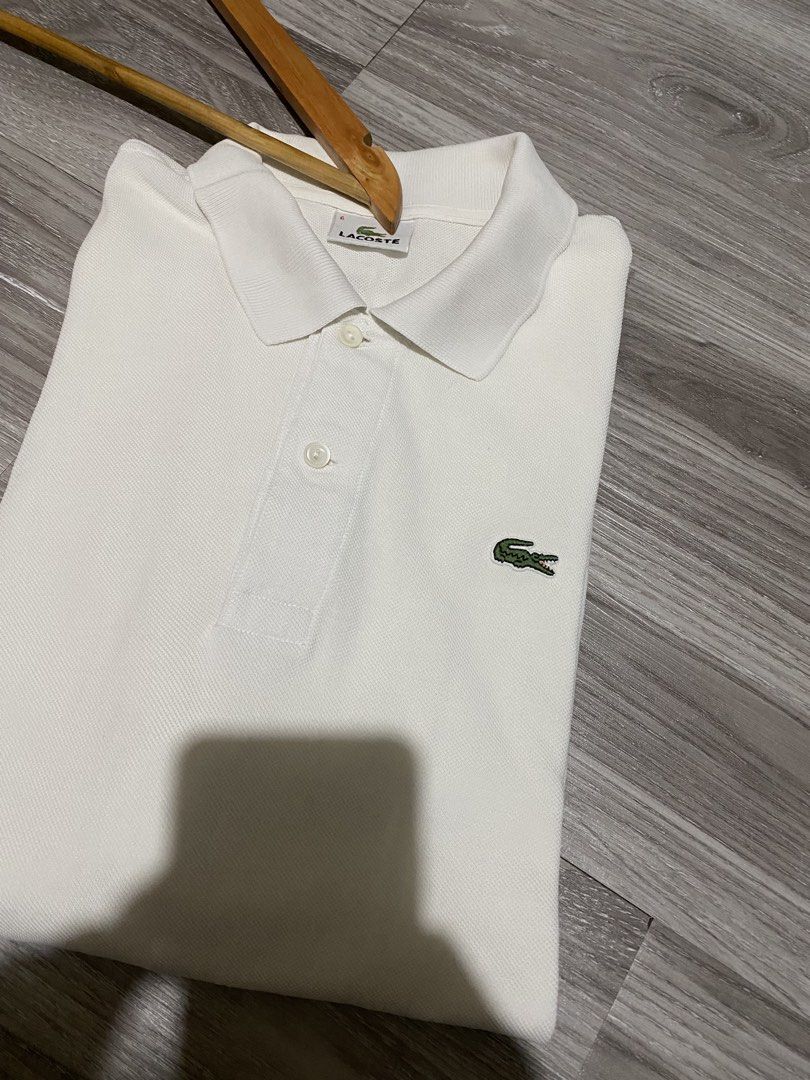 LACOSTE WHITE POLOSHIRT (Category: Tshirts & Polo Shirts ) located in Bacolod City. Submitted by reymart.esogon (Listing ID 1465612479, Image 1). Description: Size 6 on tag Like new condition No issue Authentic Washed & ready to wear.