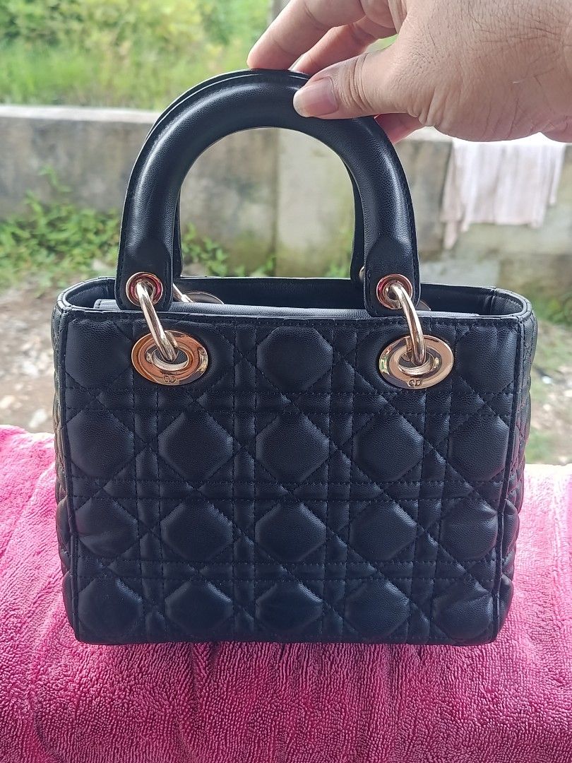 Lady Dior (Category: Luxury Bags & Wallets) located in Bulacan. Submitted by barbscee (Listing ID 1465602084, Image 3). Description: In Excellent condition. Pwede sa maarte. No Scratches or Bakbak. Sign of usage sa metal parts..