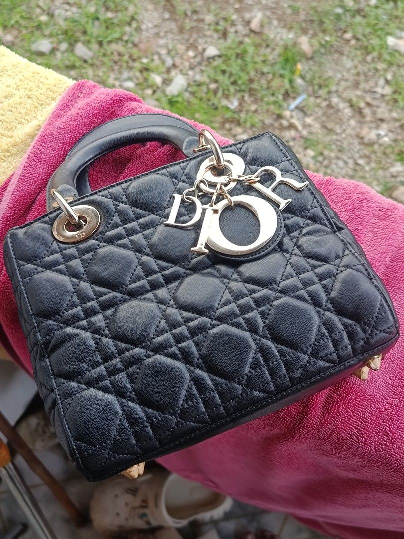 Lady Dior (Category: Luxury Bags & Wallets) located in Bulacan. Submitted by barbscee (Listing ID 1465602084, Image 2). Description: In Excellent condition. Pwede sa maarte. No Scratches or Bakbak. Sign of usage sa metal parts..