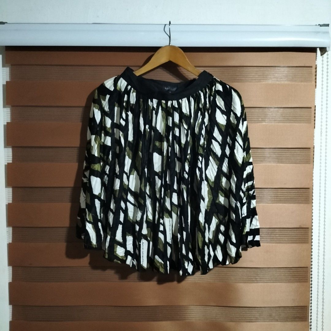 Lanvin Collection Rare flared Pleated skirt (Category: Skirts) located in Aloran. Submitted by thrift_hunter73 (Listing ID 1465692410, Image 1). Description: Lanvin Collection Rare flared Pleated skirt.