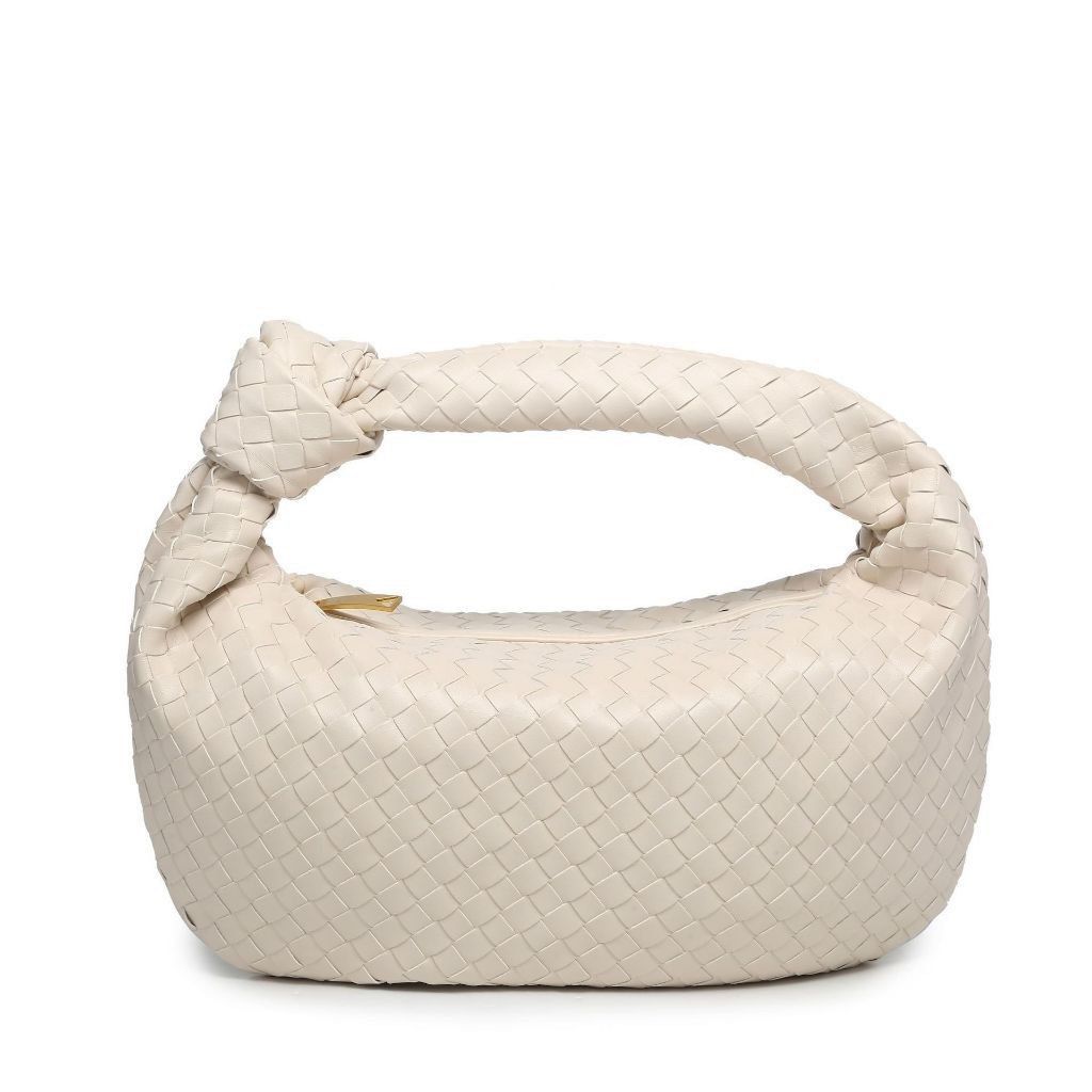 Leather Woven Small Handbag (Category: Purses & Pouches) located in Marikina City. Submitted by preloved_n_reloved (Listing ID 1465664768, Image 1). Description: - Color: Off White - Hardware: Gold-tone - Closure: Top zip - Handle: Knotted top handle - Condition: Excellent, stored carefully with zero marks or scuffs - Style: Compact, minimalist, and sits comfortably on the arm.