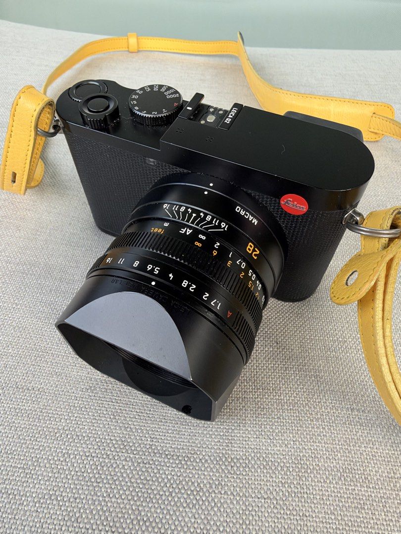 Leica Q2 Black Paint Finish Digital Camera （分類：相機）位於 Hong Kong。 由 alterego2047 提交（商品編號 1465672450，圖片 2）。簡介： Leica Q2 digital camera in black paint finish with Summilux 28mm f/1.7 ASPH lens. Includes original box, yellow leather strap and official receipt. Only flaw is a small dent on the lens cap.。