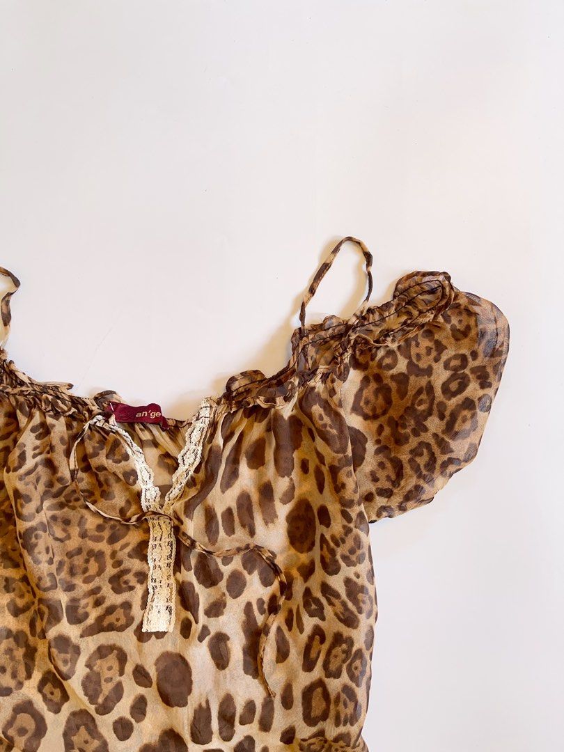 Leopard Print Off-Shoulder Sheer Top (Category: Others Tops) located in Lianga. Submitted by preyala (Listing ID 1465668272, Image 2). Description: Leopard Print Off-Shoulder Sheer Top Size: M-l Bust: 35-37 Length: 21 Mine 220 Grab 250 Grabbing ends at 10:00 PM (today).
