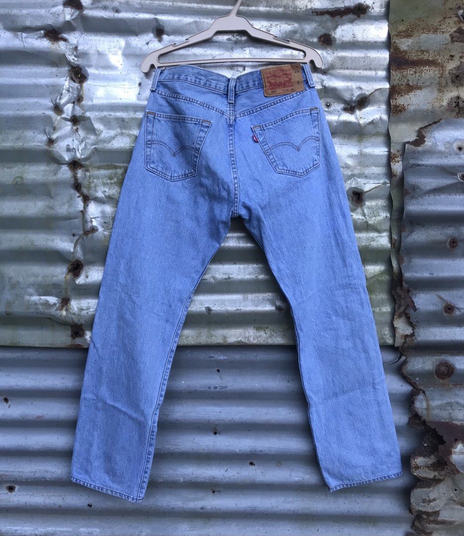 Levi's 501 Light Wash Jeans (Category: Jeans) located in Ajuy. Submitted by qpal.com (Listing ID 1465579456, Image 2). Description: - Brand: Levi's - Style: Classic 501 straight leg fit with button fly - Wash: Light wash blue denim - Details: Signature leather patch on back waistband, classic arcuate back pockets, and red tab - Versatility: Perfect everyday jeans that go with any outfit.