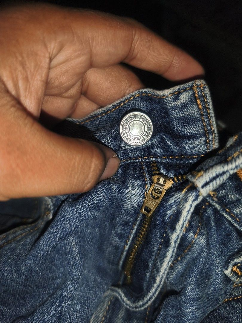 Levi's 505 Distressed Denim Shorts (Category: Shorts) located in Cagayan de Oro. Submitted by elijah350below (Listing ID 1465681953, Image 3). Description: - Brand: Levi's 505 - Style: Cut-off denim shorts in a dark wash - Fit: Mid to high rise with button fly - Size: W32 L29 (marked on classic leather back patch) - Details: Heavy front shredding, raw frayed hems, and back pocket red tab - Condition/Vibe: Classic vintage look, ideal for casual wa