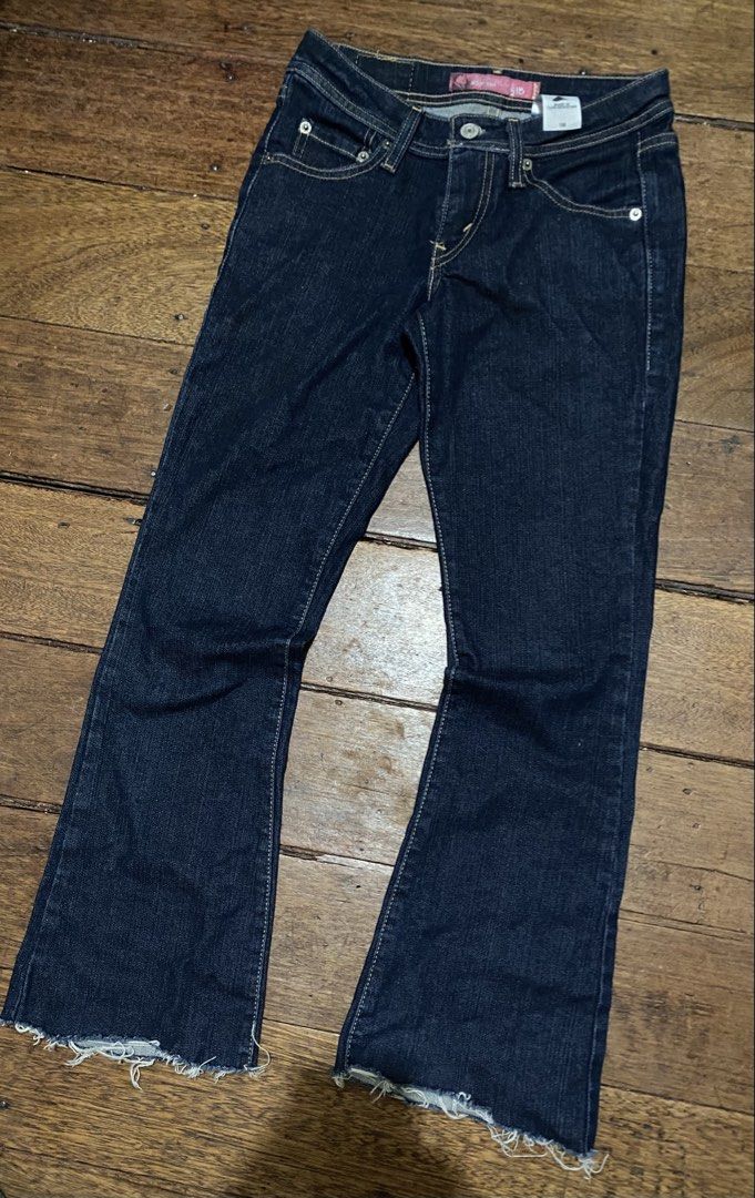 Levi's 518 Super Low Boot Cut Jeans Dark Wash (Category: Jeans) located in Caloocan City. Submitted by cleverwater.ba6482 (Listing ID 1465713521, Image 3). Description: Authentic Levi's 518 Super Low Boot Cut jeans in a versatile dark wash denim. Features a stretchy cotton blend (98% cotton, 2% lycra spandex), a button fly, and trendy raw frayed hems. Made in Turkmenistan. Size details available upon request—grab these classic Y2K staples today!.