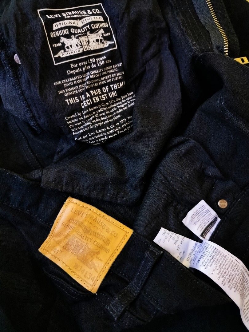 Levi's 541 Black Jeans W34 L34 (Category: Jeans) located in Manila. Submitted by gerald_quinto (Listing ID 1465708651, Image 3). Description: - Brand: Levi's Premium - Model: 541 Athletic Fit - Color: Black denim - Size: W34 L34 -Size 34 pasok 36 -Length 43 -Hem 8 - Details: Leather waist patch, iconic red tab, button closure, belt loops - Origin: Made in Pakistan - Condition: Excellent, ready to wear.