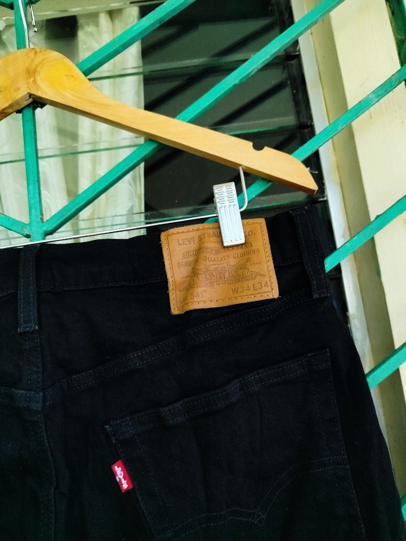 Levi's 541 Black Jeans W34 L34 (Category: Jeans) located in Manila. Submitted by gerald_quinto (Listing ID 1465708651, Image 2). Description: - Brand: Levi's Premium - Model: 541 Athletic Fit - Color: Black denim - Size: W34 L34 -Size 34 pasok 36 -Length 43 -Hem 8 - Details: Leather waist patch, iconic red tab, button closure, belt loops - Origin: Made in Pakistan - Condition: Excellent, ready to wear.