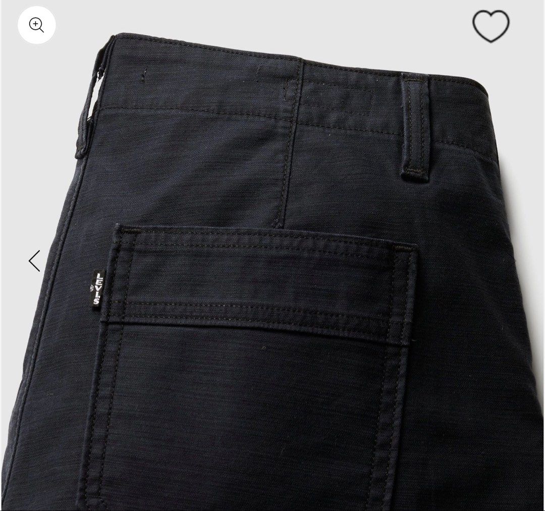 Levi's Black Canvas Utility Pants Wide Leg (Category: Jeans) located in Manila. Submitted by declutterwithv (Listing ID 1465621130, Image 2). Description: - Brand: Levi's - Color: Black / Anthracite - Style: Wide leg utility pants with a casual streetwear look - Material: Classic durable canvas structure - Details: Deep back pockets and signature Levi's branded tag - Closure: Standard button and zip waist - Condition/Use: Versatile everyday wardr