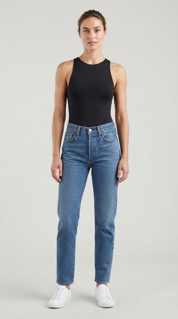 Levi's Black Tank Top Size L (Category: Sleeveless) located in Manila. Submitted by afforlux (Listing ID 1465680357, Image 1). Description: -NWT Levi’s Sleeveless High-Neck Bodysuit in Solid Black (Style 29825-0001, Size L) - Condition: Brand new with original store tags - Fit: Tight fit with soft, stretchy fabric - Design: Scoop neckline, sleeveless - Origin: Made in Sri Lanka.