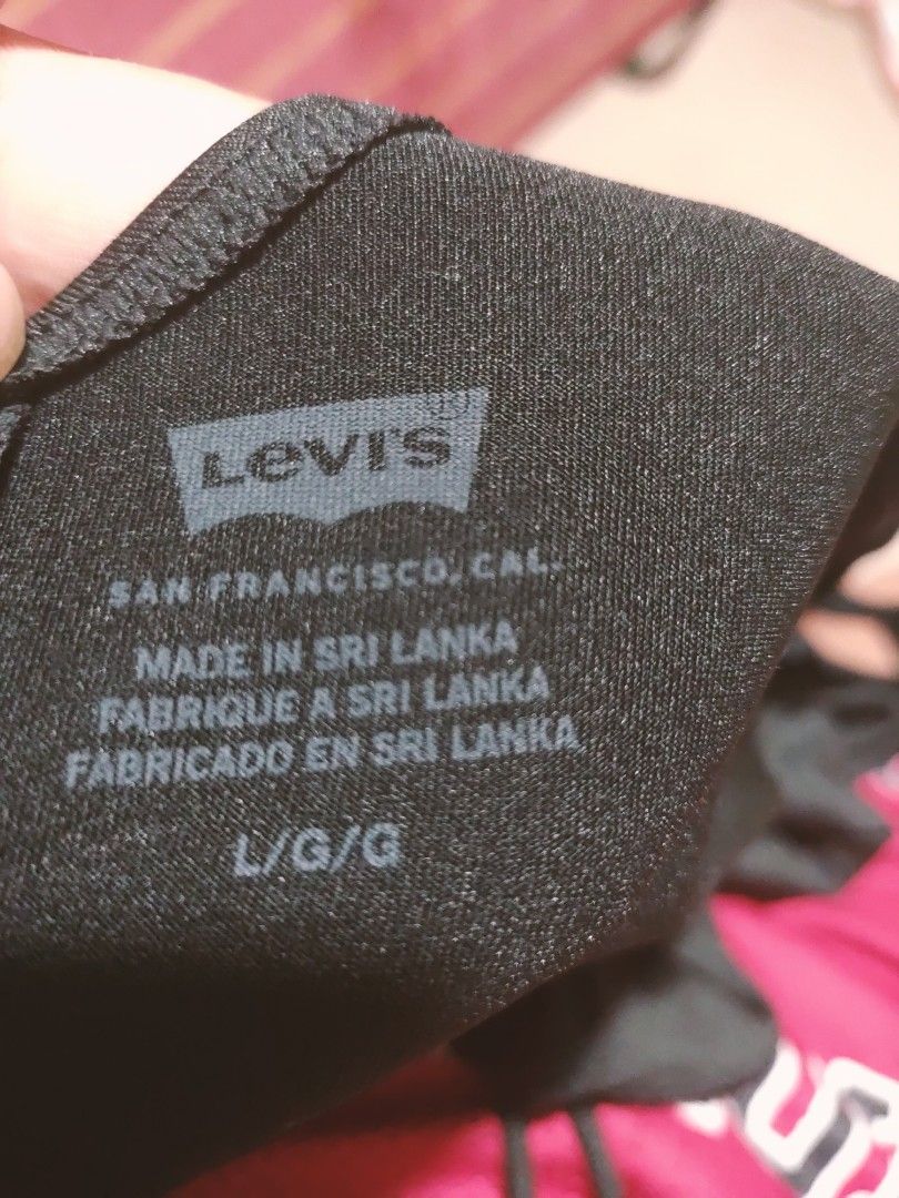 Levi's Black Tank Top Size L (Category: Sleeveless) located in Manila. Submitted by afforlux (Listing ID 1465680357, Image 3). Description: -NWT Levi’s Sleeveless High-Neck Bodysuit in Solid Black (Style 29825-0001, Size L) - Condition: Brand new with original store tags - Fit: Tight fit with soft, stretchy fabric - Design: Scoop neckline, sleeveless - Origin: Made in Sri Lanka.
