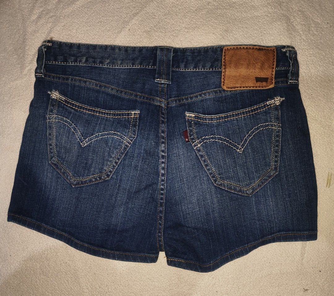 Levi's San Francisco Denim Shorts (Category: Shorts) located in Cagayan de Oro. Submitted by elijah350below (Listing ID 1465682242, Image 3). Description: - Brand: Levi's - Style: Denim shorts with distressed accents - Wash: Dark blue - Waist Size: 27 - Fit: Mid-rise with classic 5-pocket styling - Details: Leather back patch and pink Levi's San Francisco inner waistband print - Origin: Made in Indonesia - Condition: Excellent/Ready to wear excel