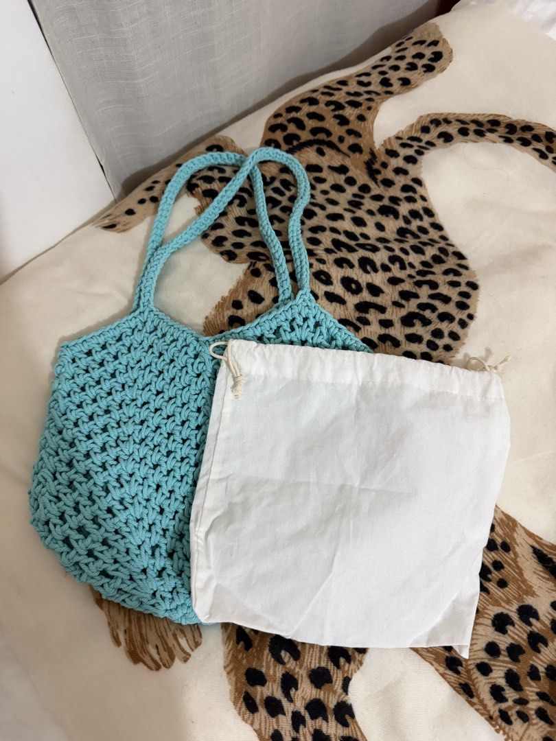 Light blue crochet shoulder bag with inner pouch (Category: Shoulder Bags) located in Manila. Submitted by mengxir20193848 (Listing ID 1465719381, Image 2). Description: - Handmade light blue crochet shoulder bag - Cozy chunky yarn knit pattern with sturdy matching straps - Includes a separate white cotton drawstring inner pouch for security - Perfect size for daily essentials: phone, wallet, and keys.