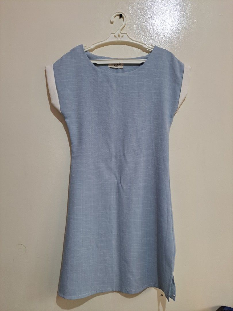 Light Blue Dress with White Cap Sleeves (Category: Dresses) located in Manila. Submitted by yselles__ (Listing ID 1465606389, Image 1). Description: - Design: Structured boat neckline and clean minimalist look - Length: Knee-length cut with a straight hem - Fabric: Textured material throughout - Occasion: Ideal for casual or smart-casual outings - Condition: Excellent, clean.
