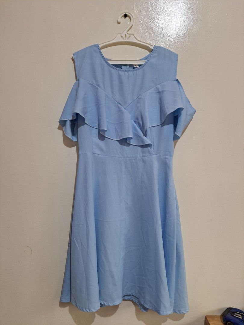 Light blue ruffle sleeve midi dress (Category: Dresses) located in Manila. Submitted by yselles__ (Listing ID 1465606392, Image 1). Description: - Style: Midi dress with cold shoulder cutouts and layered ruffle sleeves - Fit: Fitted waist with a flattering flared skirt silhouette - Closure: Convenient back zipper - Condition: Excellent, clean with no stains or damage - Perfect for: Casual outings, dates, and weekend events.