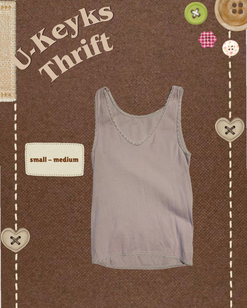 Light Purple Tank Top (Small - Medium) (Category: Sleeveless) located in Cavite. Submitted by ukeyks (Listing ID 1465700070, Image 1). Description: - Color: Basic Purple - Detail: Delicate lace trim along the neckline and hem - Fit: Comfortably fits small to medium frames - Fabric: Soft material with a clean finish .