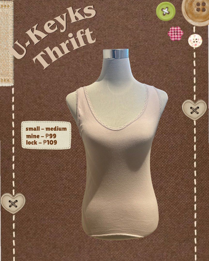 Light Purple Tank Top (Small - Medium) (Category: Sleeveless) located in Cavite. Submitted by ukeyks (Listing ID 1465700070, Image 2). Description: - Color: Basic Purple - Detail: Delicate lace trim along the neckline and hem - Fit: Comfortably fits small to medium frames - Fabric: Soft material with a clean finish .