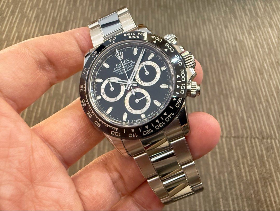 Like New Sep 23 Rolex Oyster Perpetual Cosmograph Chronograph Daytona Black Godzilla 116500 116500LN (Category: Watches) located in Singapore. Submitted by thetimeco (Listing ID 1465598395, Image 3). Description: Condition: Like New 9.9 / 10 Box Papers: Complete set dated Sep 2023. 5 years Rolex international warranty until Sep 2028. RX8 film protection on. White tag available. Case Diameter: 40mm Material(s): Stainless Steel, Black Ceramic Bezel