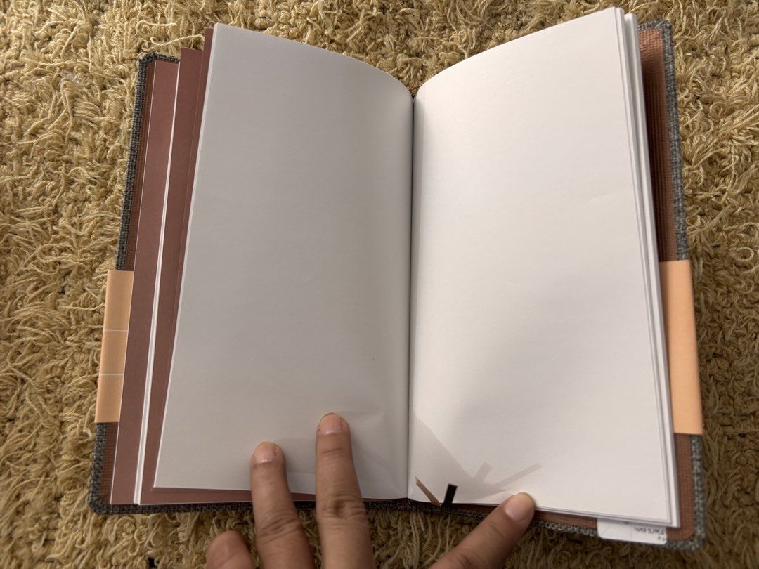 Linen Cover Planner (Category: Stationery & School Supplies) located in Quezon City. Submitted by ghieshopppps (Listing ID 1465589418, Image 2). Description: Keep memories of your journeys with a handy, multi-functional journaling tool to collect experiences and adventures. Size : 13 x 21 cm Refillable Linen Cover - 64 Lined Pages - 64 Dot Pages - 64 Blank Pages Pages made from recycled paper 70g 📚 Actual Journal Posted ✅ Complete pages ✅ Origin
