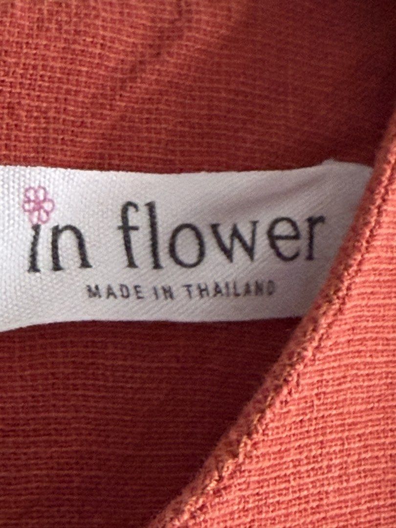 Linen In Flower Rust Orange Sleeveless Bubble Hem Top (Category: Sleeveless) located in Bacolod City. Submitted by francine_favss (Listing ID 1465598239, Image 2). Description: - Brand: In Flower - Color: Rust orange -Size: best fit to Medium or Large with smaller chest - Style: Sleeveless with a round neckline and structured bubble hem - Fit: Relaxed fit - Material: Textured cotton - Origin: Made in Thailand .